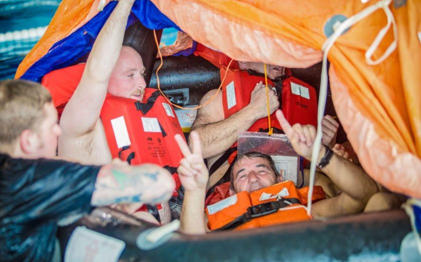 Practice getting into a life raft on STCW course in Gibraltar
